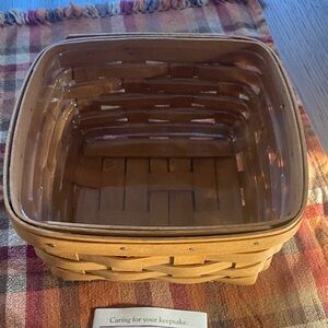 Longaberger Woven Basket with durable plastic protector.